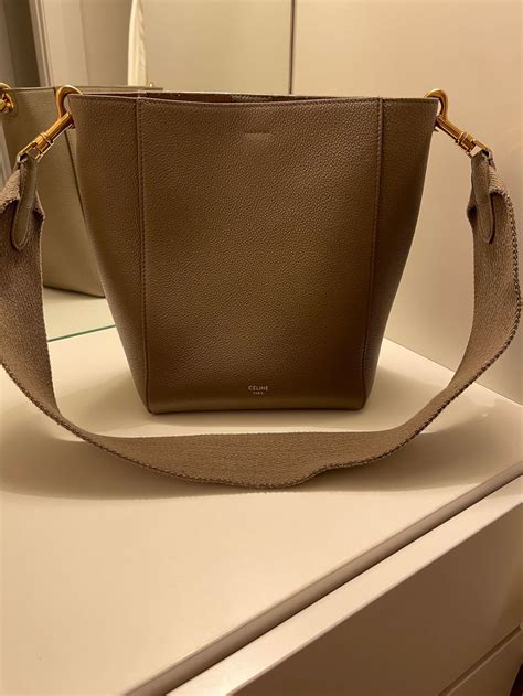 taupe sangle bag.